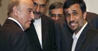 Iranian President Mahmoud Ahmadinejad, right, speaks with Swiss President Hans-Rudolf Merz